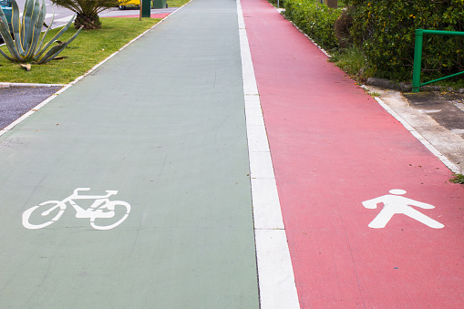bicycle and pedestrians reserved lanes  made of green and red asphalt in forte dei marmi tuscany italy