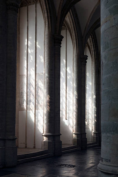 istock light and shadow formed by pilars in cathedral 473795676
