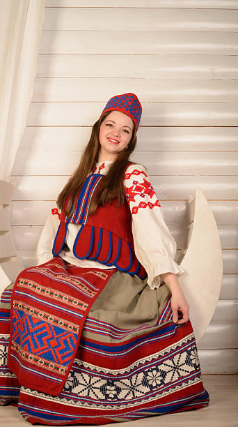 istock young woman in Slavic Belarusian national original suit studio 473795800