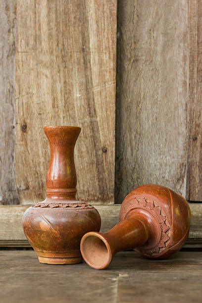 istock antique vase on wooden background 473796488