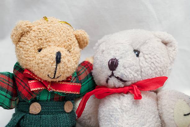 istock Two Teddy Bears Friendship Hugging showing their Friendship 473797920