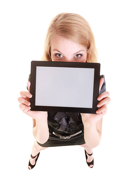 istock Businesswoman showing copy space on tablet touchpad 473800512