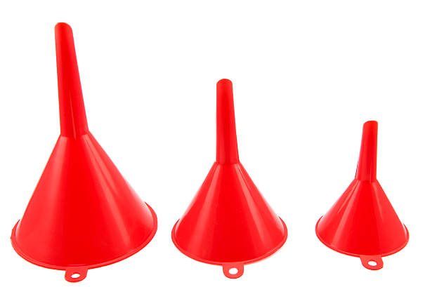 istock Different size of red plastic funnel isolated on white 473801026