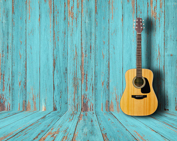 Guitar Guitar in vintage wood room. acoustic guitar photos stock pictures, royalty-free photos & images