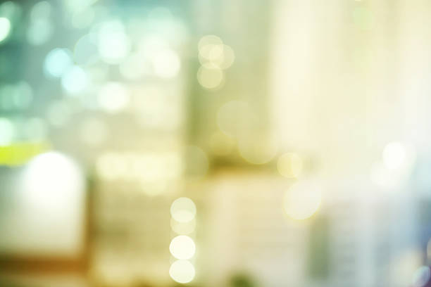 istock Blurred yellow and green urban building background 473804874