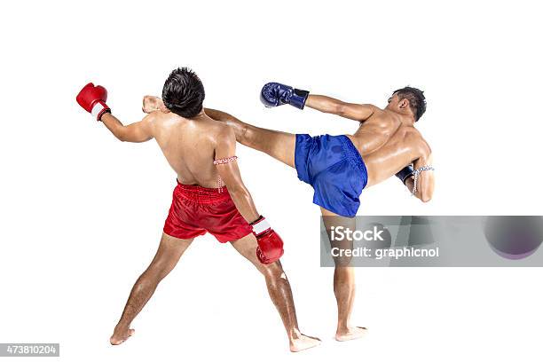 Two Thai Boxers Exercising Traditional Martial Art Stock Photo - Download Image Now - 2015, Activity, Adult