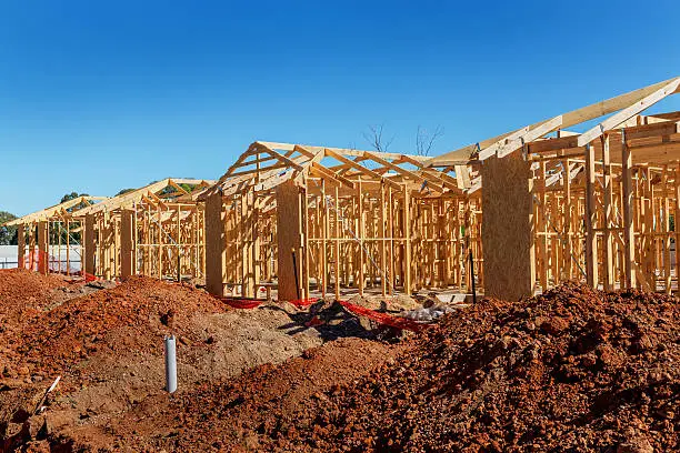 Photo of New homes being constructed on a site