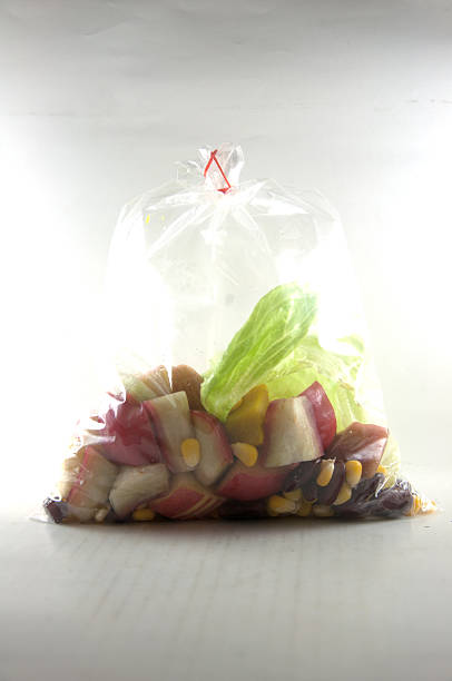 istock Fresh fruits salad in packing  on white 473822856