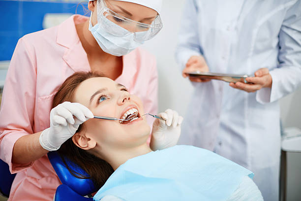 istock Girl in dentist clinic 473823582
