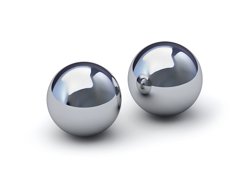Two glossy metal spheres isolated on white with clipping path