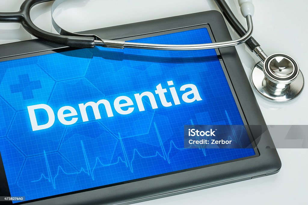 Tablet with the diagnosis dementia on the display 2015 Stock Photo