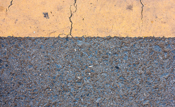 istock Asphalt road with yellow lines 473834396