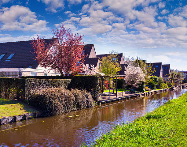istock Tipical Dutch village Zaanstad in spring sunny day. 473843650