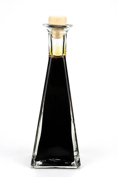 istock Traditional italian balsamic vinegar isolated on white background 473845962