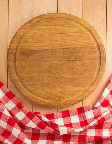 istock napkin and cutting board on wood 473846698