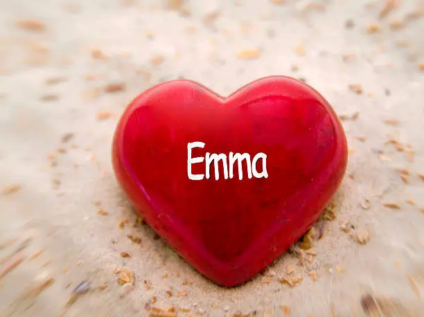 Photo of red heart on sand for Emma