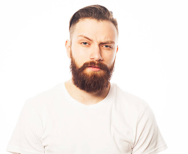 Stylish bearded man in white shirt.