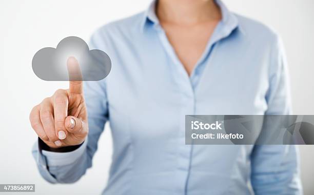 Businesswoman Pressing Cloud Icon On The Digital Touch Screen Stock Photo - Download Image Now