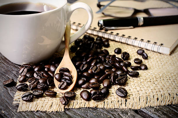 istock Cup of coffee and coffee beans 473869546