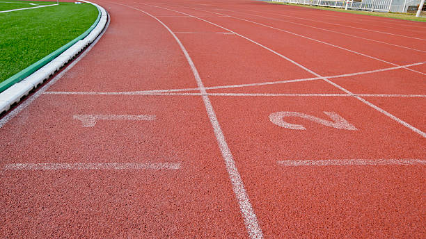istock Athletic running track with number one,two in stadium 473873916