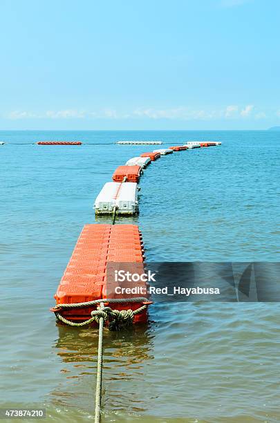 Line Of Buoy On The Beach Stock Photo - Download Image Now - 2015, Blue, Buoy