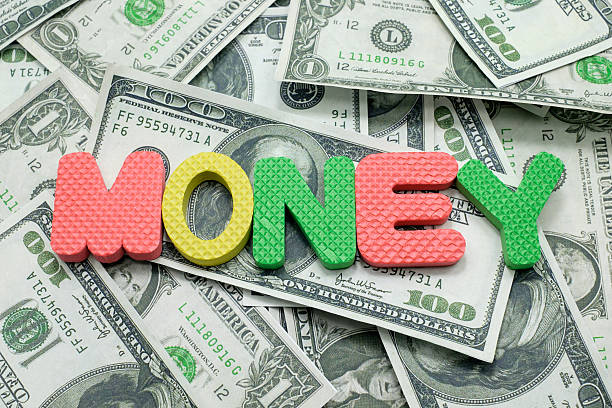 istock Money word on Us dollar banknote on the background 473880470