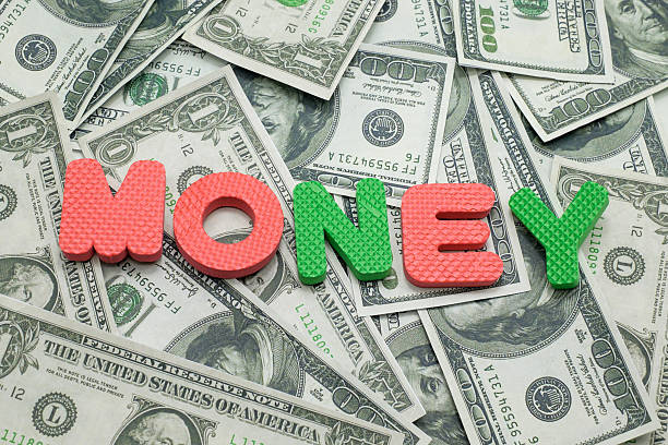 istock Money word on Us dollar banknote on the background 473880488