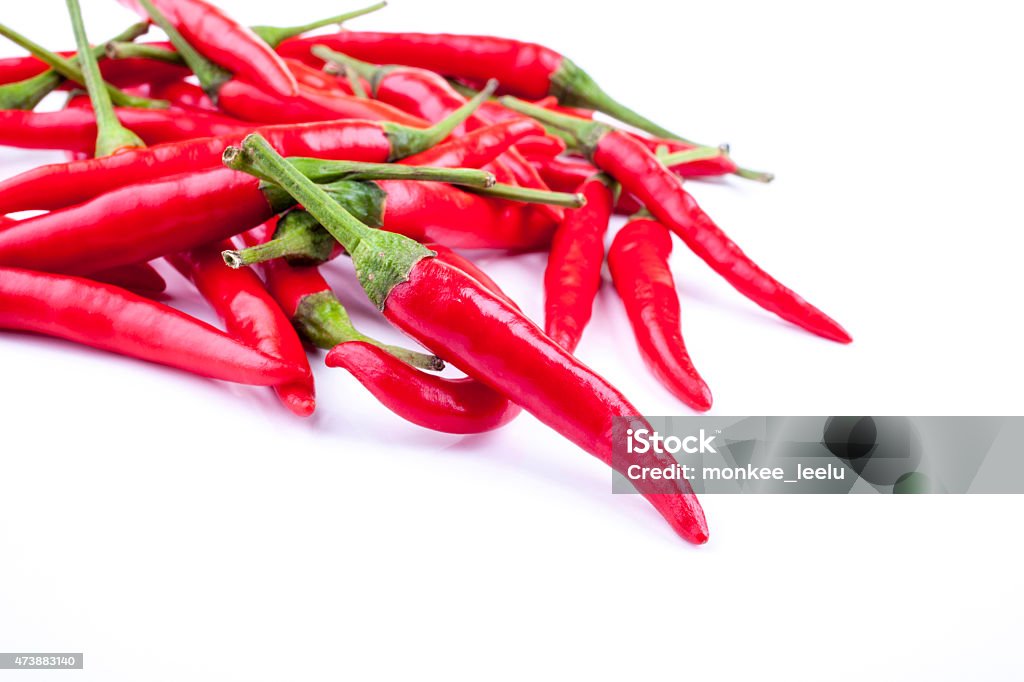 Chilies Chilies bunch shot isolated on a white background front on at an angle 2015 Stock Photo