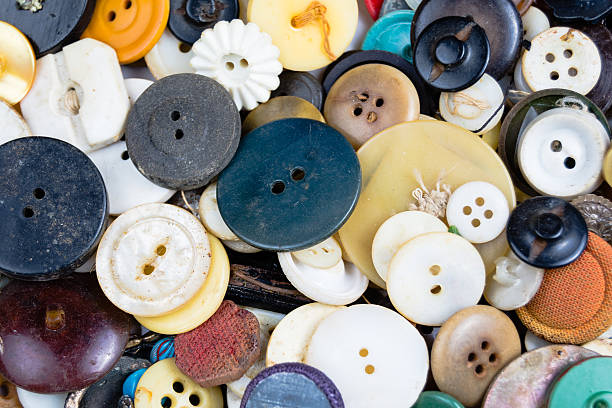 istock Buttons of many colors and sizes background 473898954