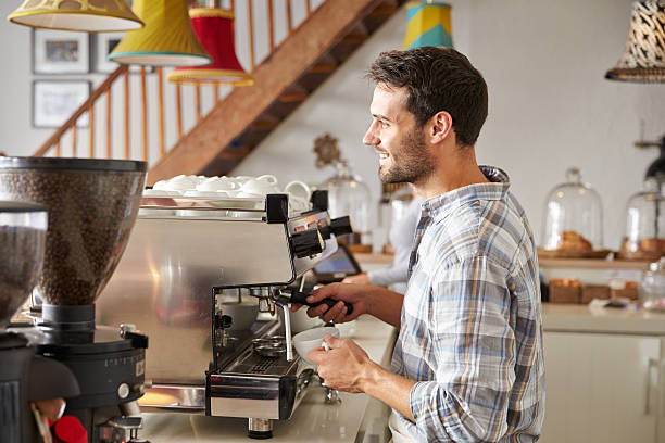 istock Barista at work in a cafe 473909184