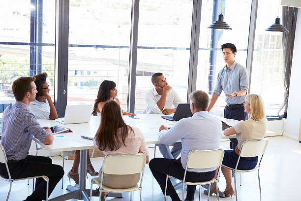 istock Businessman presenting to colleagues at a meeting 473909426