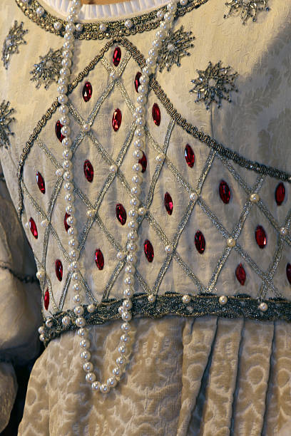 istock ancient medieval princely dress  with precious Pearl Necklace 473909622