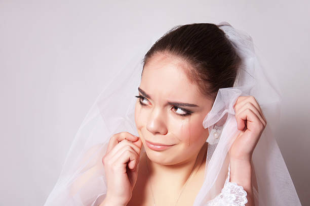 istock Portrait of a beautiful bride crying 473912520