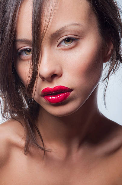 istock Portrait Beauty women with red lipstick 473917072