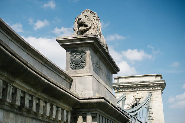 istock Lion statue on Chain Bridge in Budapest 473917108