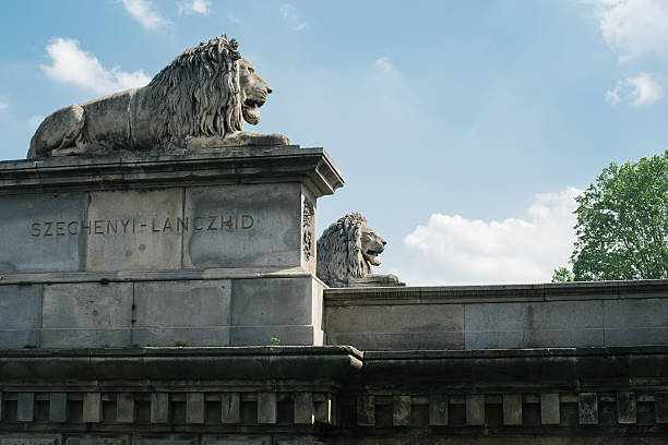 istock Lion statues on Chain Bridge in Budapest 473917112