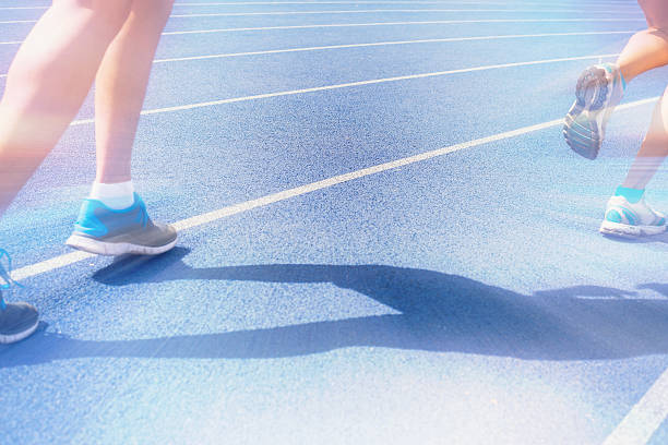 istock marathon of blurred motion crowd people jogging outdoor 473919366