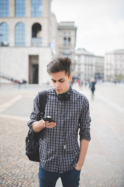 istock young handsome alternative dark model man in town 473926456
