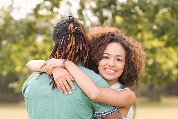 istock Cute couple in the park 473939852