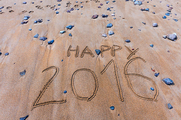 istock Happy New Year 2016 Written on Sand, Morocco 473940196
