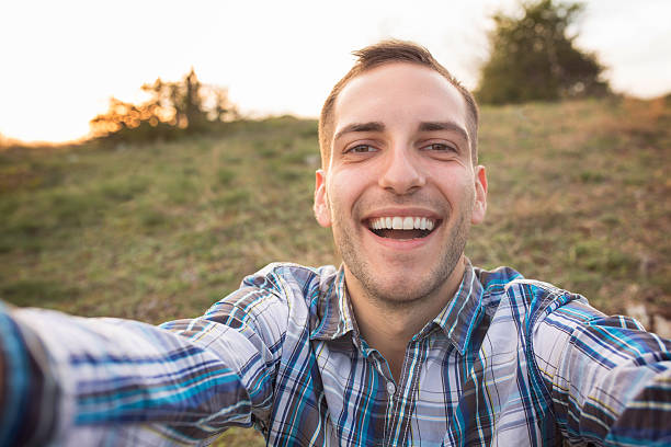 istock Selfie of young men in a park 473946724