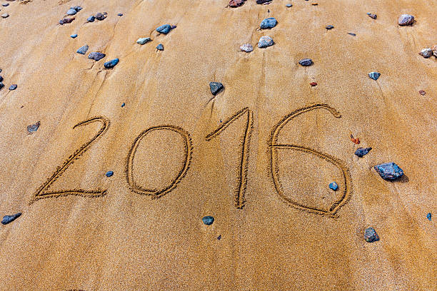 istock Happy New Year 2016 Written on Sand, Morocco 473947734