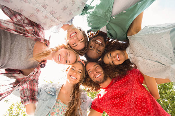 istock Happy friends in the park 473957826