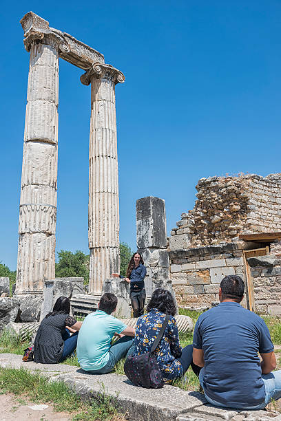 istock Guide and tourists in Aphrodisias 473961866