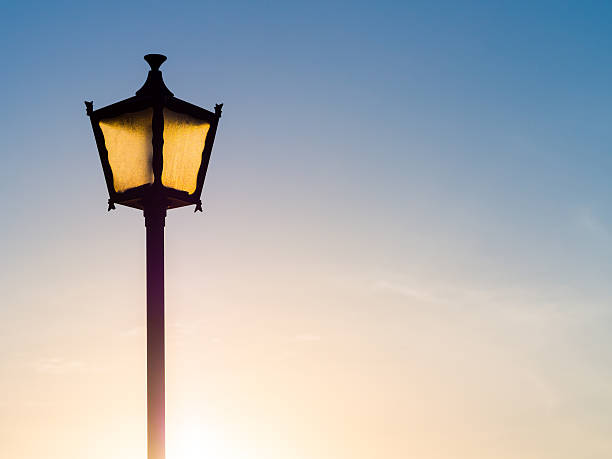 istock Old fashioned street lamp, background 473964784