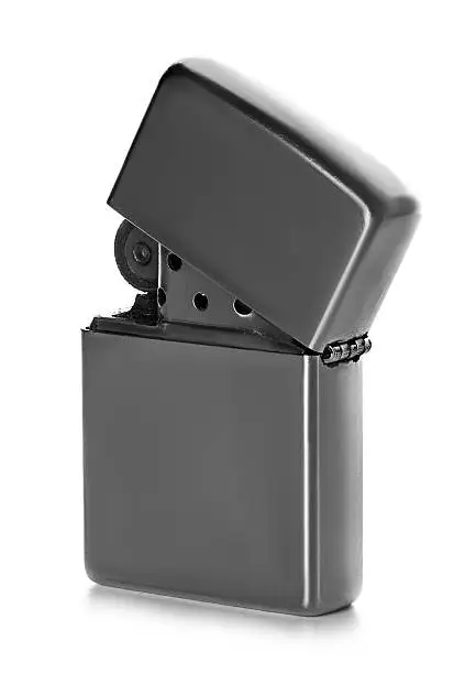 Photo of Silver metal zippo lighter isolated on white