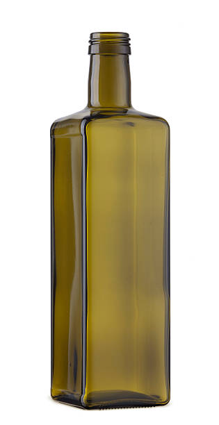 istock Empty cooking oil glass bottle isolated on the white 473968632