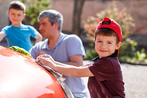 istock Family car wash 473969764