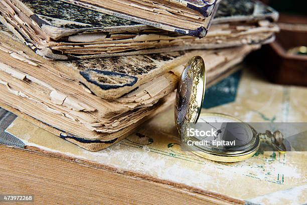 Old Books And Pocket Watch Stock Photo - Download Image Now - 2015, Antique, Book