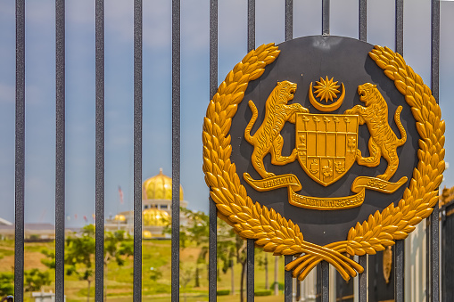 Royal seal on the gate of the new Istana Negara, which is the royal residence of the Yang di-Pertuan Agong supreme ruler of Malaysia in Kuala Lumpur, Malaysia